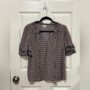 Floral vneck blouse with ruffle sleeves